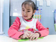 Child playing with a toy
